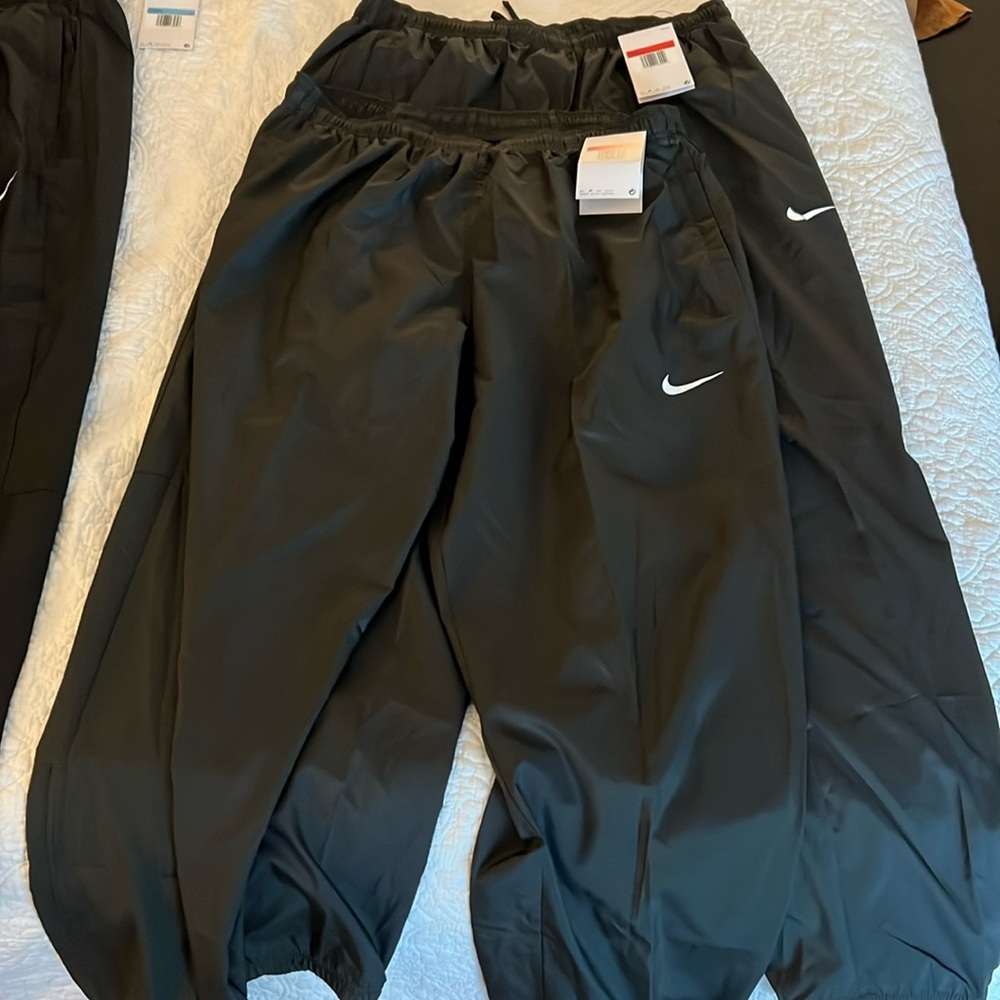 Men’s Nike parachute joggers two pair new with tags